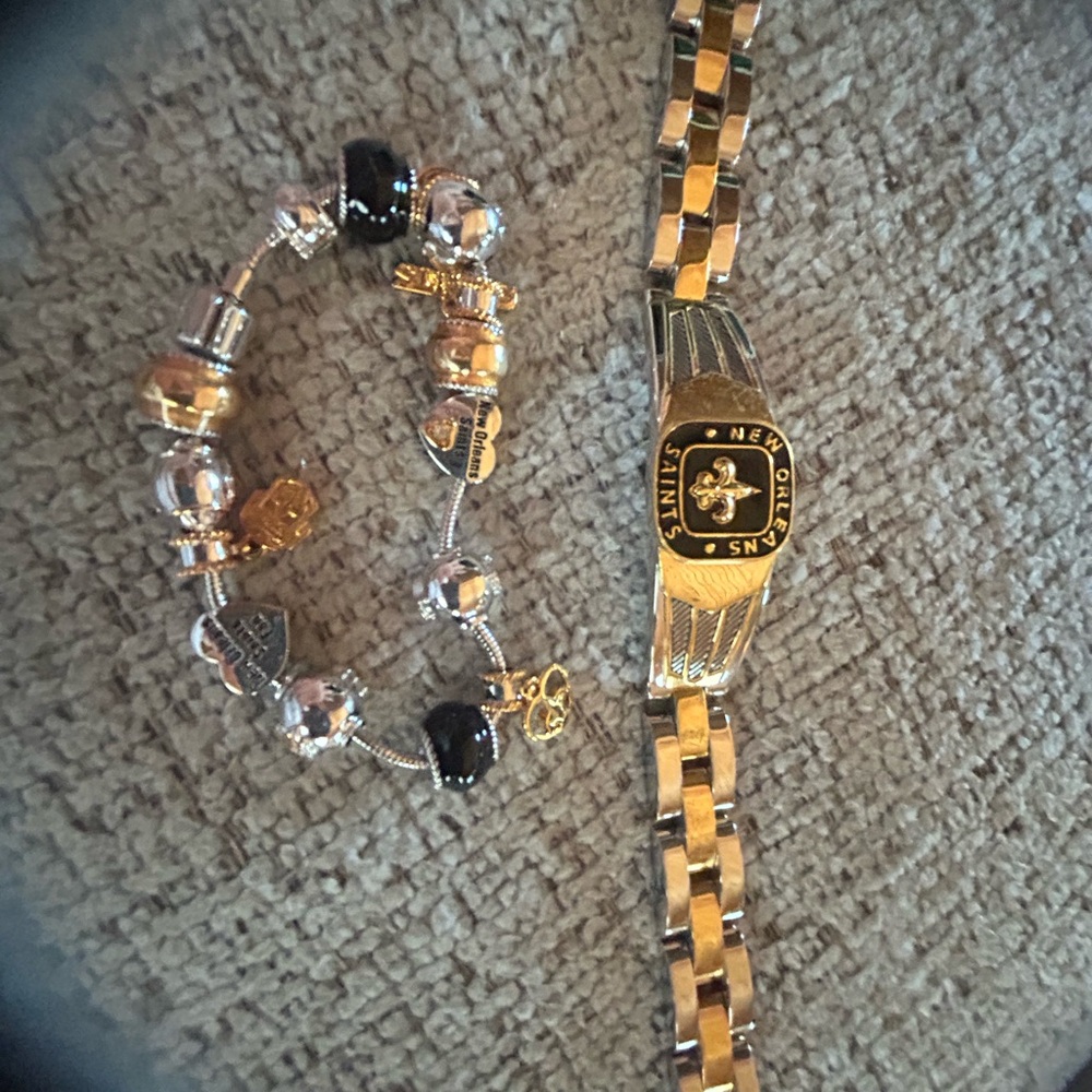 Gold and Silver New Orleans Saints Bracelet Set. HIS AND HERS!!! Never worn.